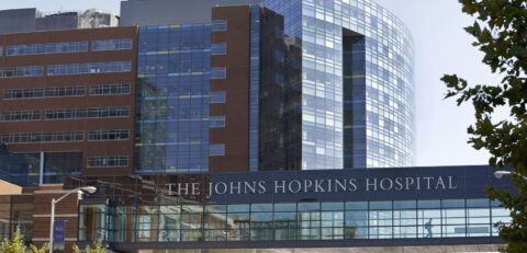 FILE - This Oct. 2, 2013, file photo shows part of the Johns Hopkins Hospital complex in Baltimore. The hospital has reached a tentative labor agreement with a union representing about 2,000 workers at the medical institution. A Hopkins spokeswoman said Tuesday, July 8, 2014, that a union vote will take place over the next couple of days on the tentative agreement. (AP Photo/Patrick Semansky, File)